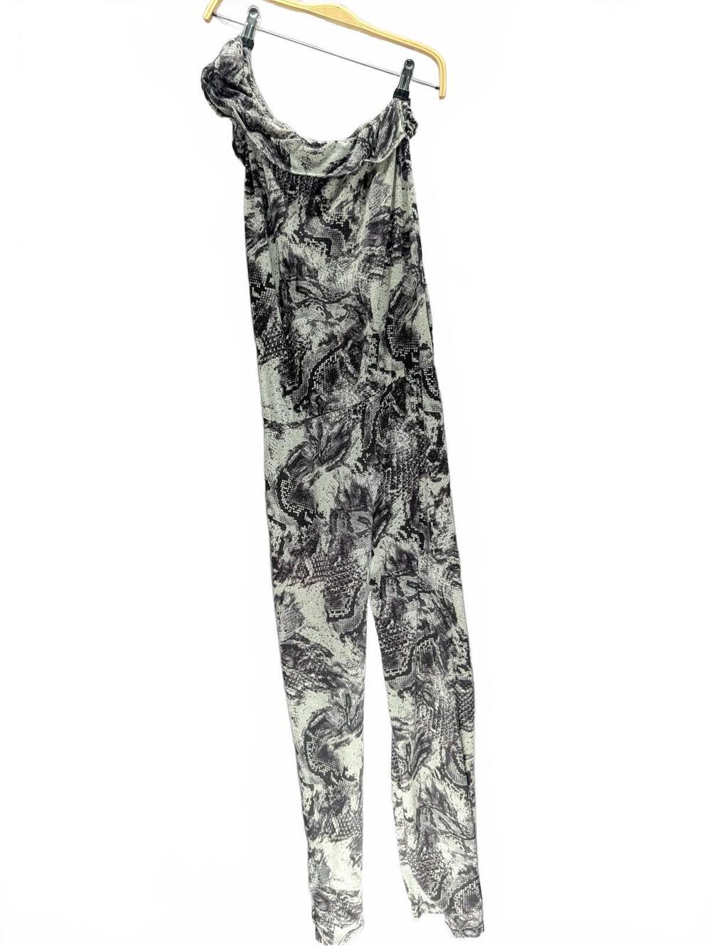 Stylish Black and White Patterned Jumpsuit with Ruffle Neck